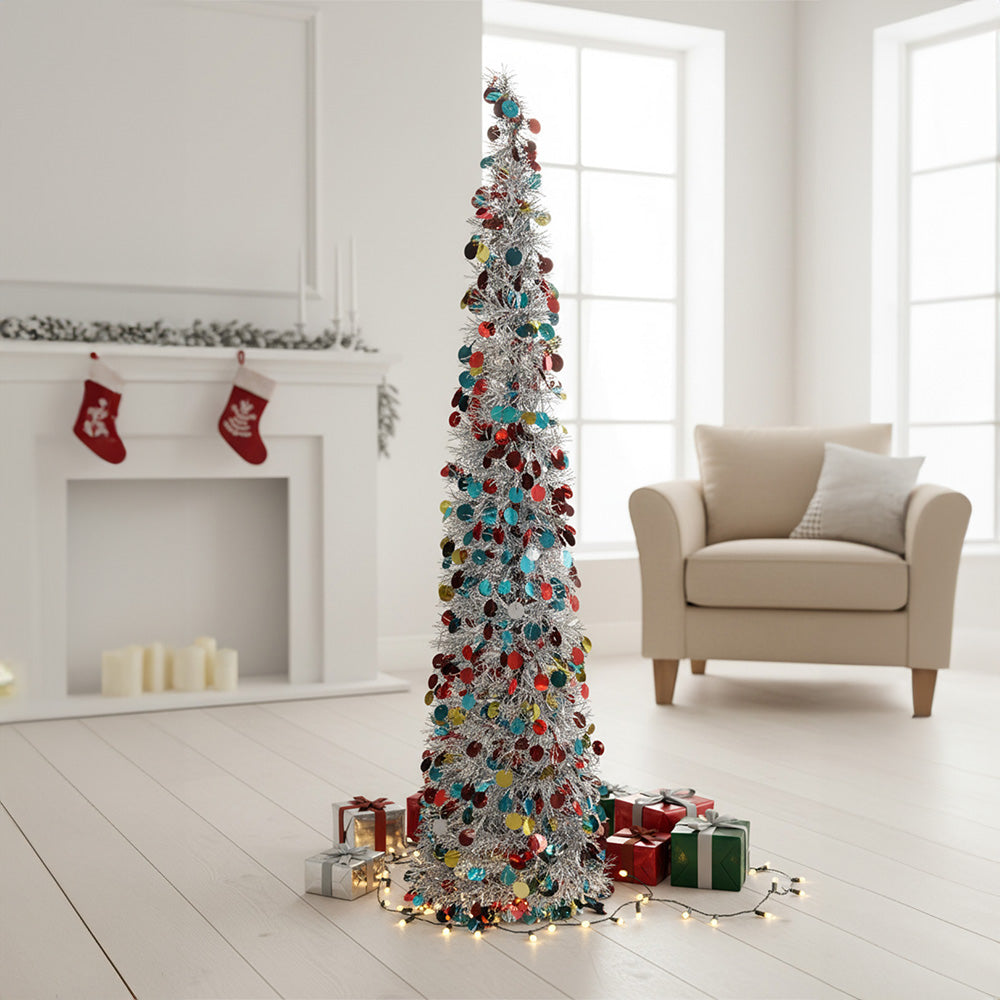 Colorful 150cm Garden Sanctuary Christmas tinsel tree decorated with multicolored ornaments and festive lights.